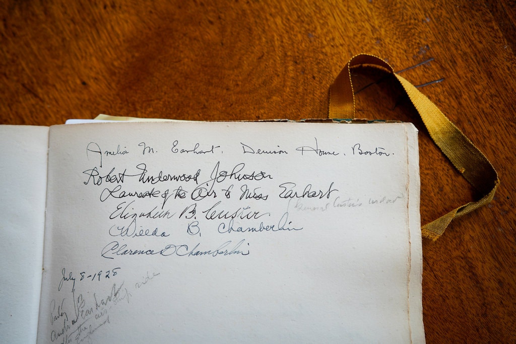 Thumbnail for the post titled: The Mystery of This Dusty Book, Signed by Amelia Earhart and Eleanor Roosevelt